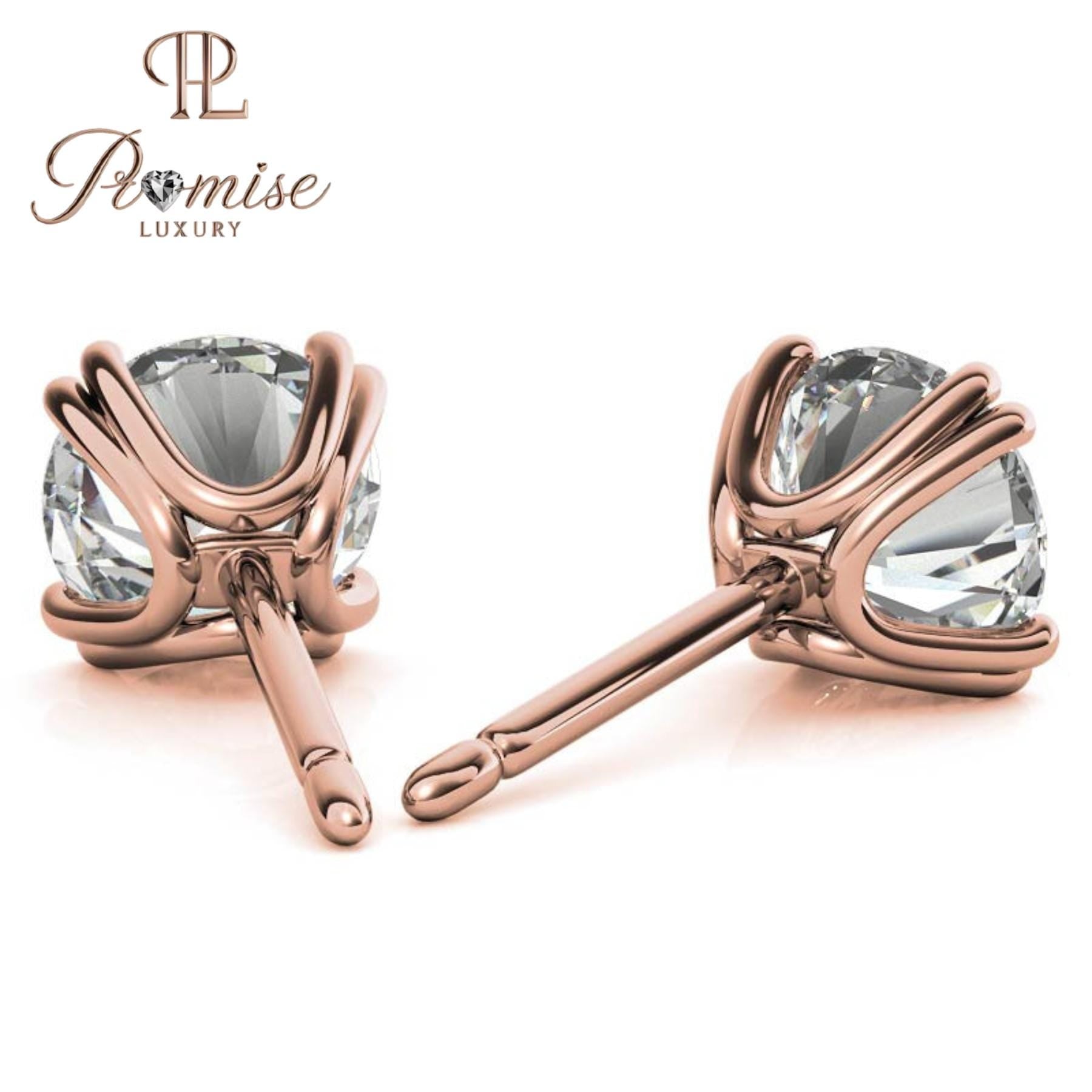 Stunning diamond floral stud earrings in 18K gold featuring a radiant center with a sparkling halo of brilliant round diamonds