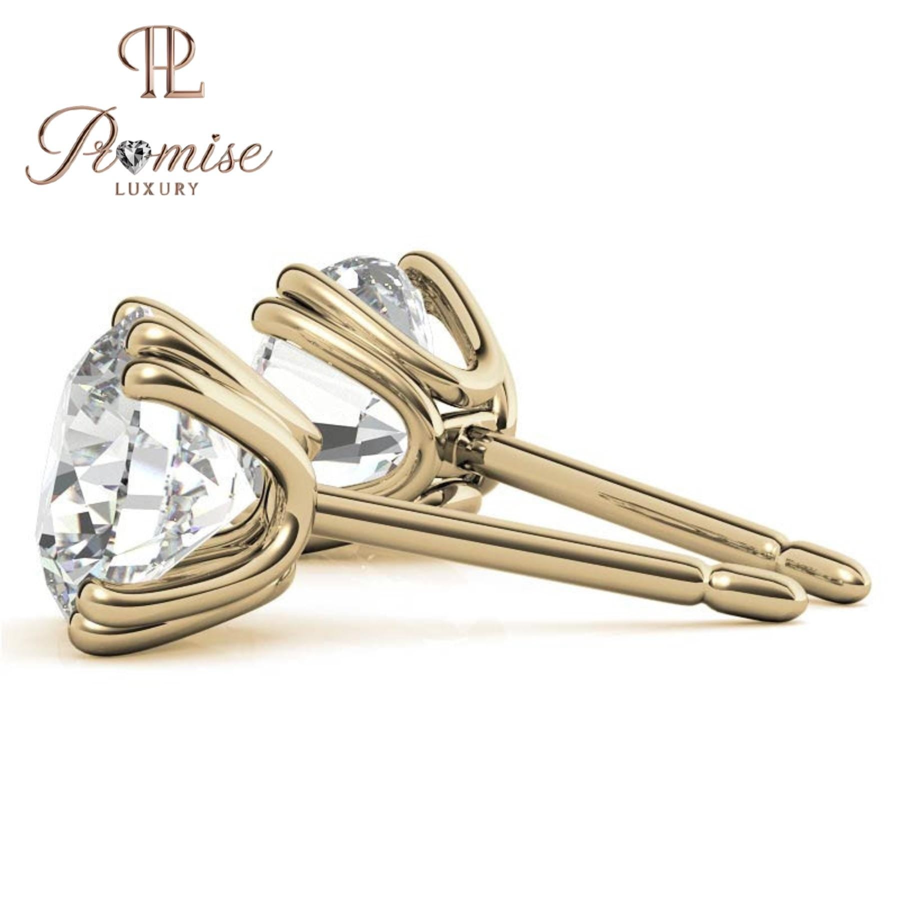 Stunning diamond floral stud earrings in 18K gold featuring a radiant center with a sparkling halo of brilliant round diamonds